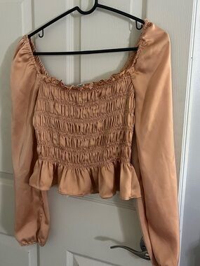 Smocked Peplum Long-Sleeve Top in Blush